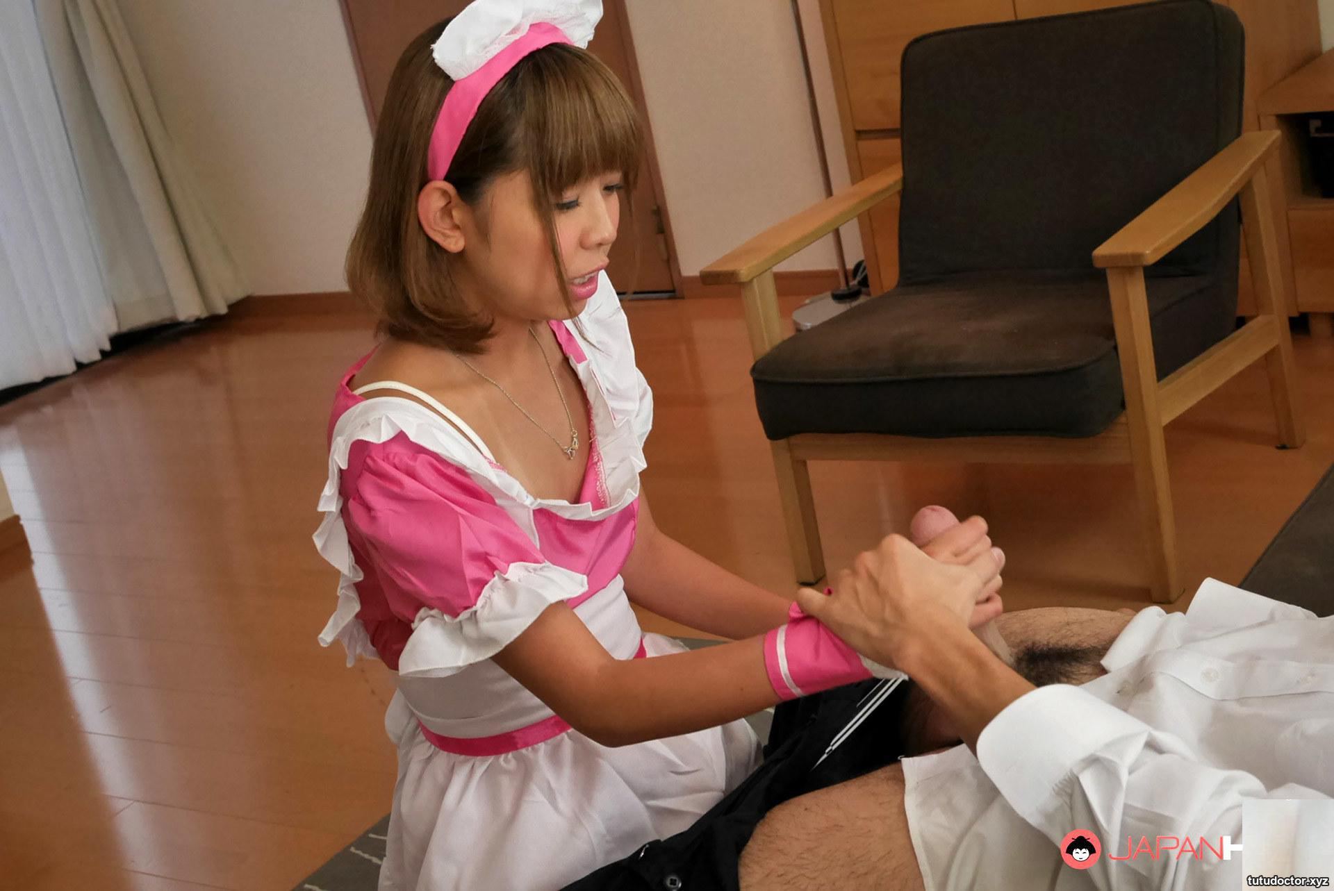 Pink black girl maid kneels down to lick dick and give blowjob · photo 2 of 16
